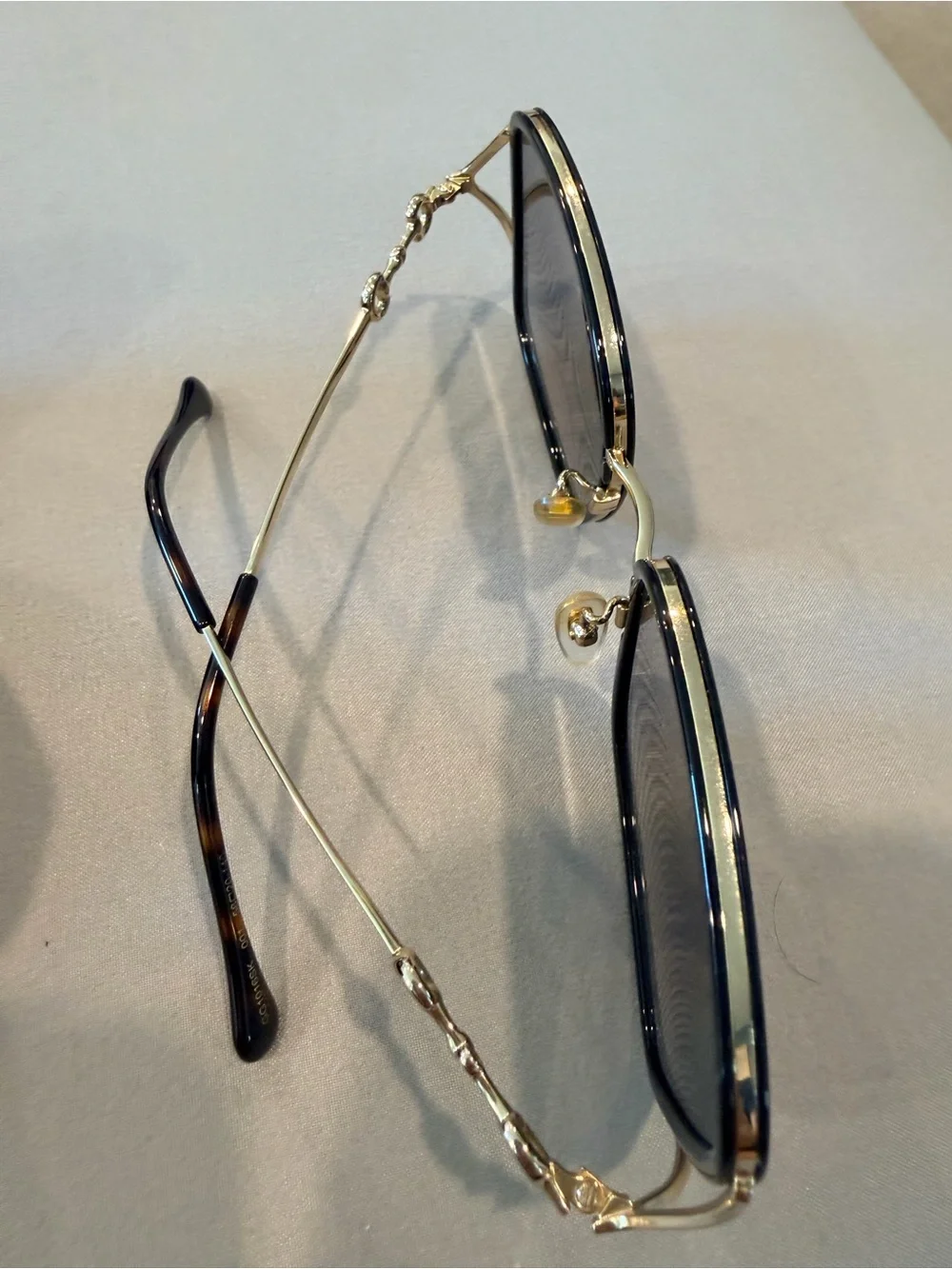 Gucci Black and Gold Oval Sunglasses